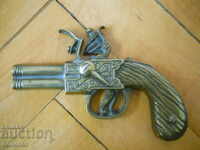 Bronze wall applique - flint gun