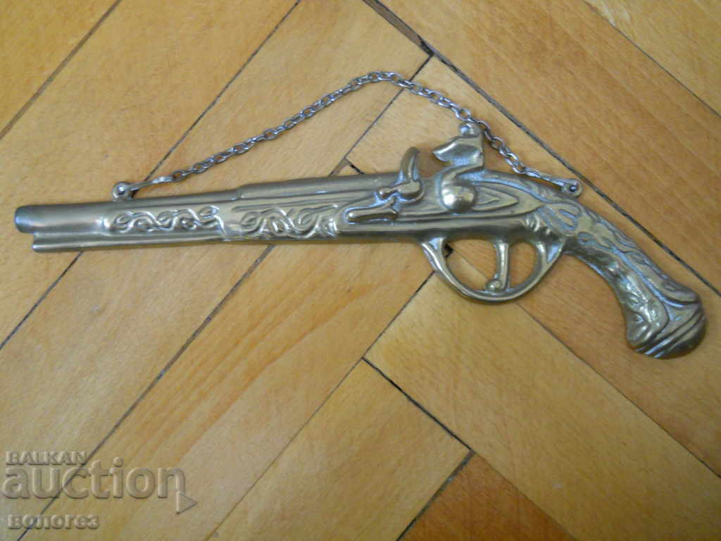 Bronze wall applique - flint gun