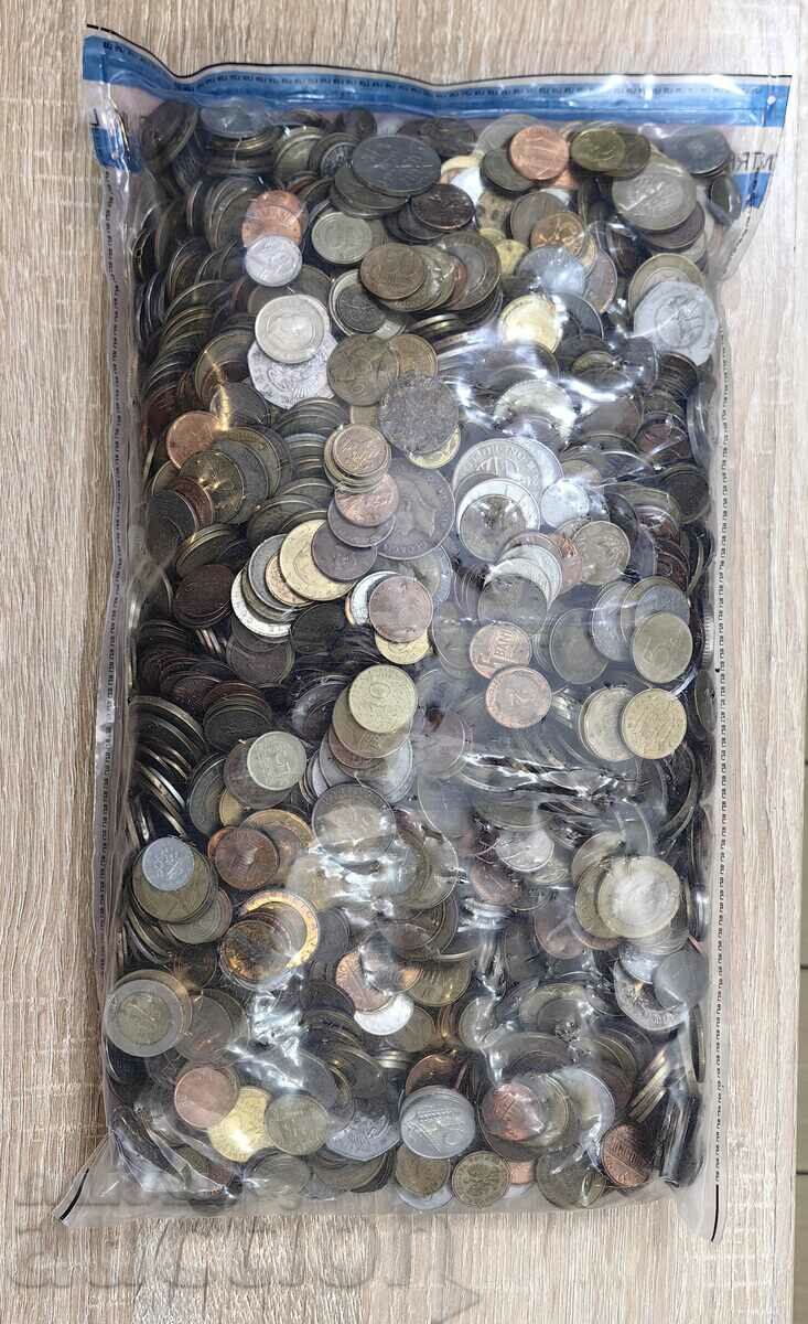 An envelope with 8 kilograms of coins from around the world