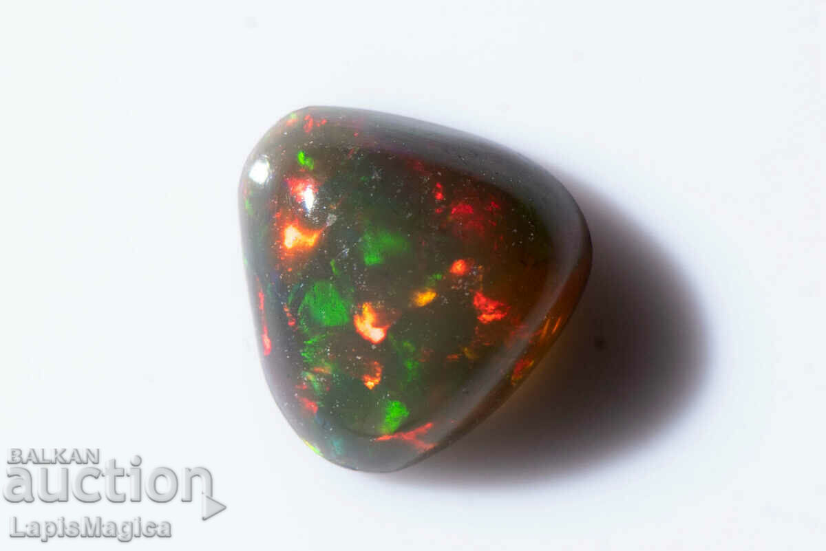 Opal etiopian 0,41 ct trilioane Cabochon #9