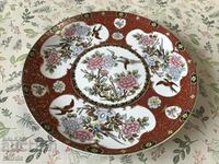 A beautiful porcelain plate with markings