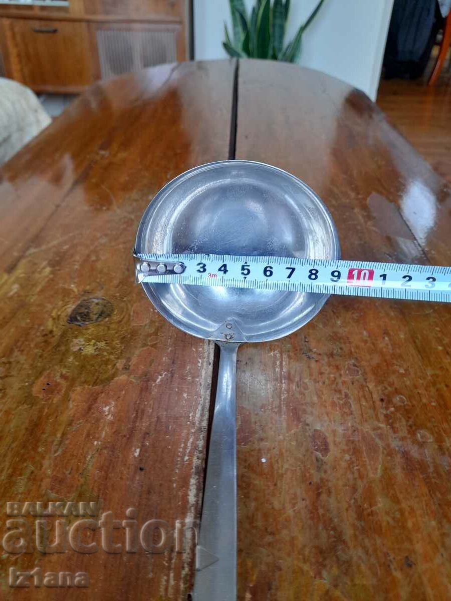 Auction An old ladle Auction An old ladle