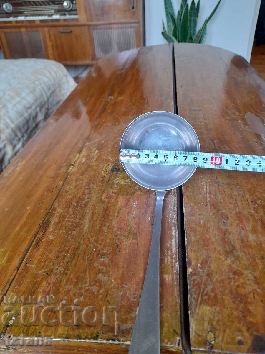 Auction An old ladle Auction An old ladle