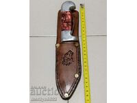 Old tourist knife with leather sheath