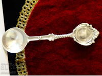 A pewter spoon for a pewter wedding, anniversary.