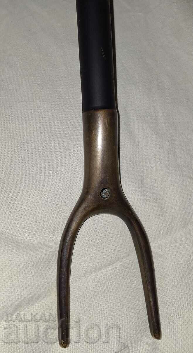 Auction Antique metal tool with bronze plastic and two prongs Auction Antique metal tool with bronze plastic and two prongs