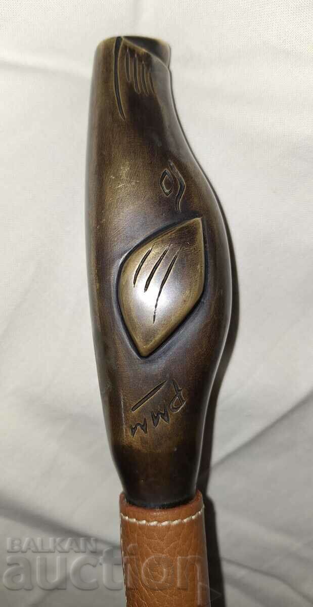 Delivery of Antique metal tool with bronze plastic and two prongs Delivery of Antique metal tool with bronze plastic and two prongs