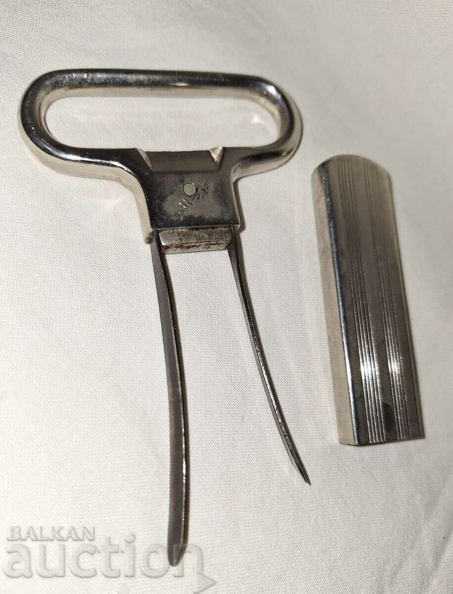 Old metal corkscrew--Monopol