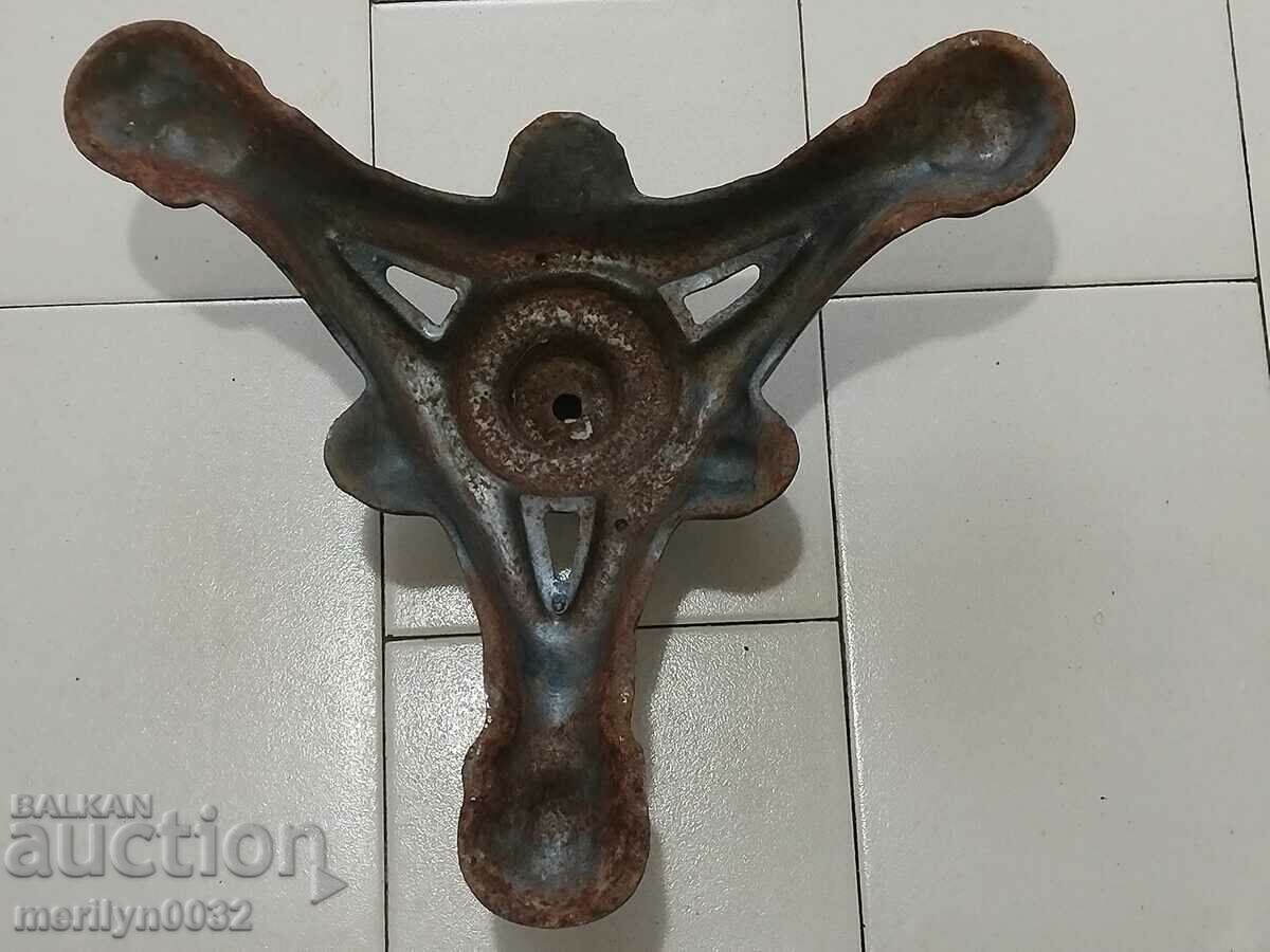 Auction  Early 20th century relief cast iron tripod table stand