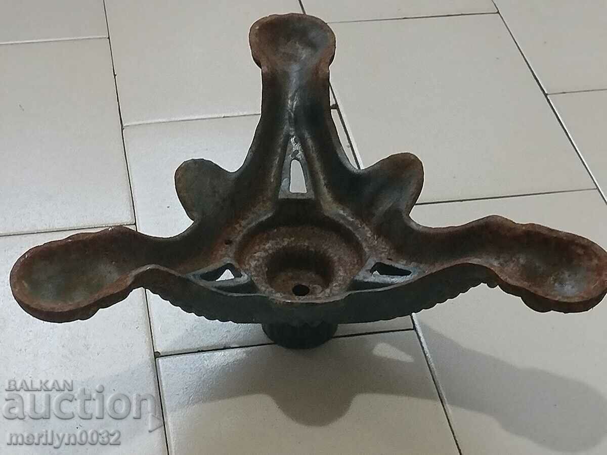 Delivery of Early 20th century relief cast iron tripod table stand