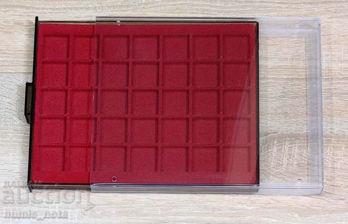 Delivery of coin trays with protective cover - 35 slots x 36 mm. Delivery of coin trays with protective cover - 35 slots x 36 mm.
