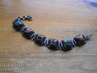 Old metal bracelet with semi-precious stones