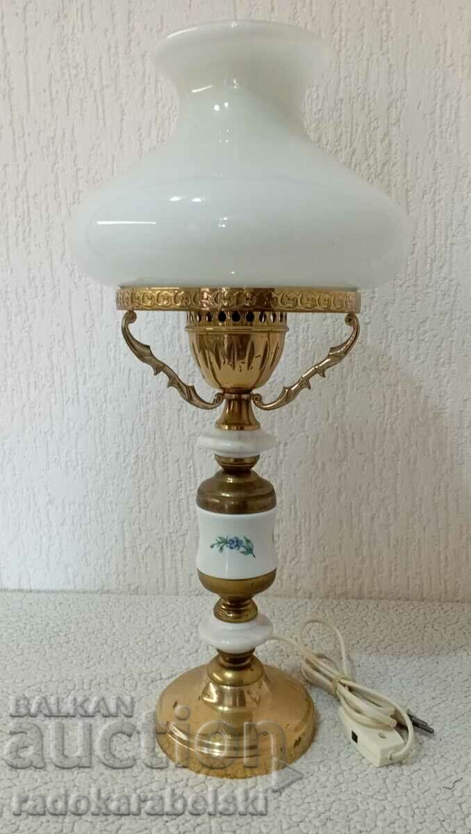 A beautiful vintage lamp with a white glass shade