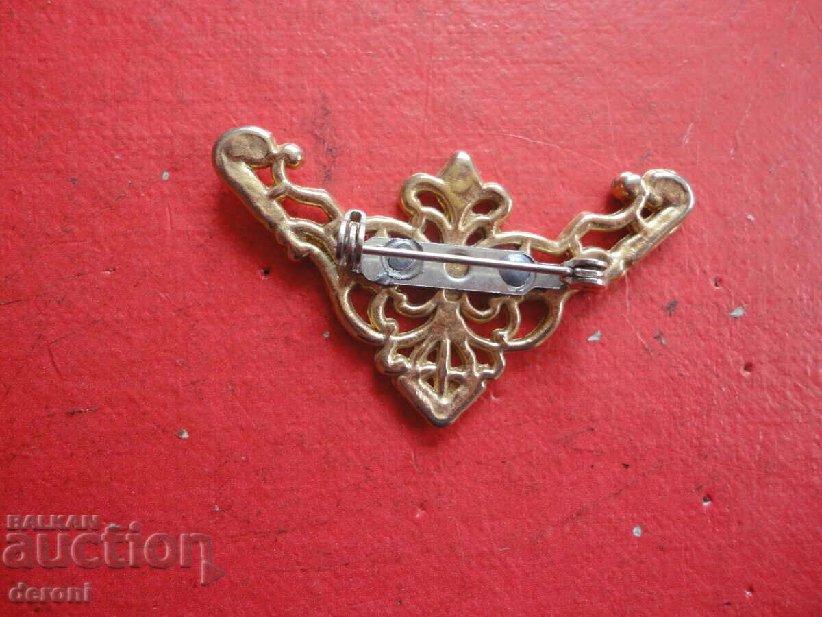 Auction Gilt brooch 54 Auction Gilt brooch 54