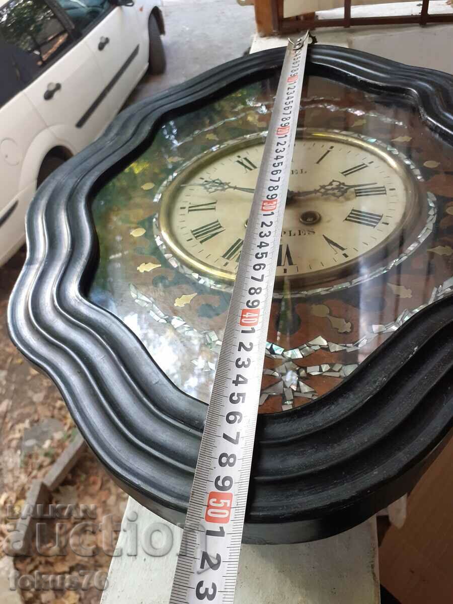 Delivery of A lovely antique mother of pearl inlaid wall clock Delivery of A lovely antique mother of pearl inlaid wall clock