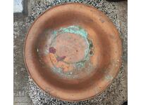 Old unused copper basin Bakker