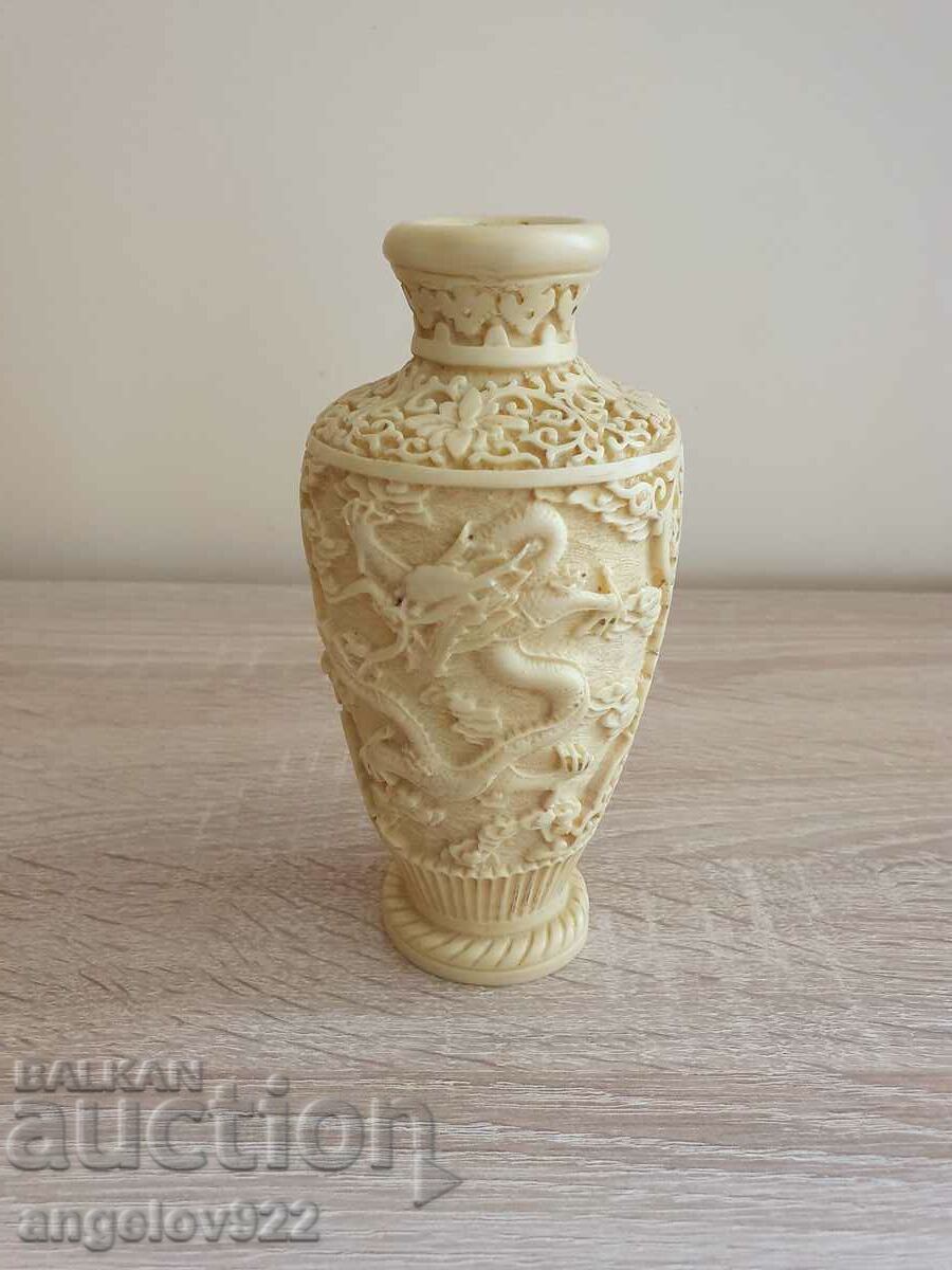 A beautiful alabaster vase with relief figural images!