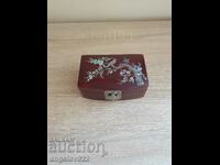 Vintage mahogany jewelry box with embossed inlays