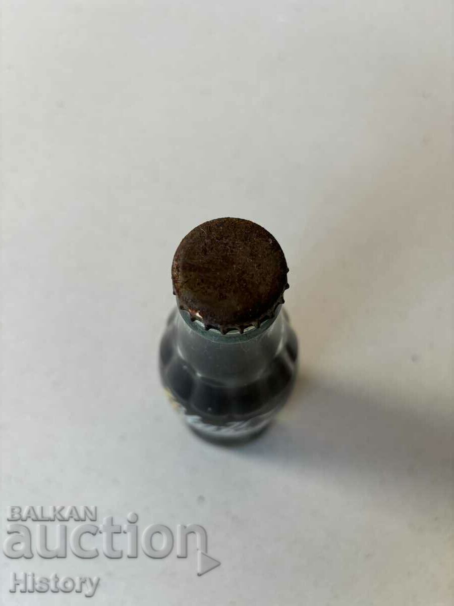 Licitație Sticla de Coca Cola, Coca Cola