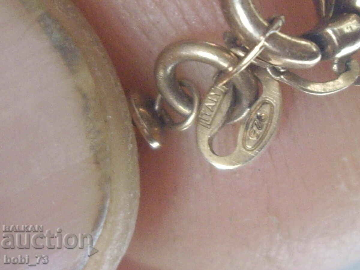 Delivery of Gold-plated, silver bracelet. Delivery of Gold-plated, silver bracelet.