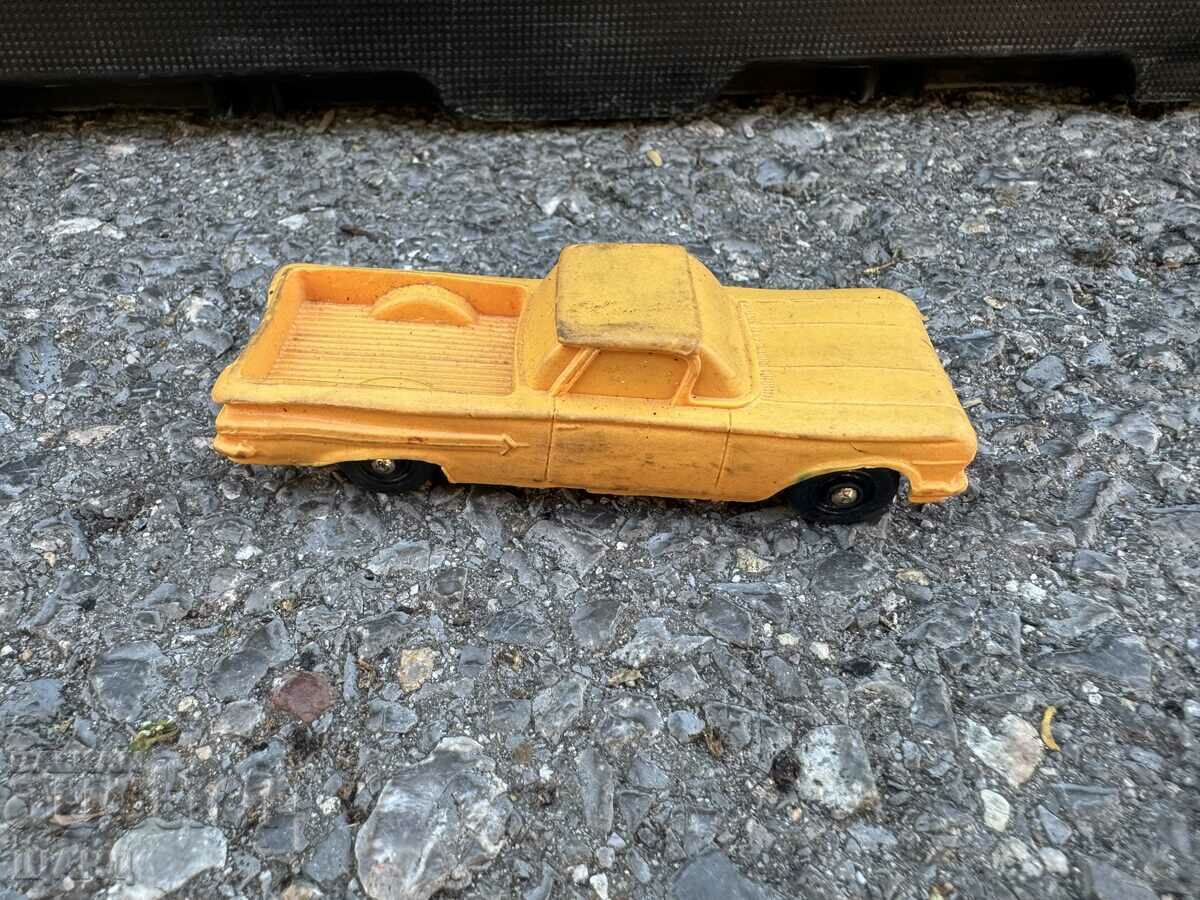 Old rubber toy model jeep pickup truck