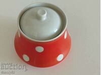 Old porcelain orange sugar bowl from the USSR.