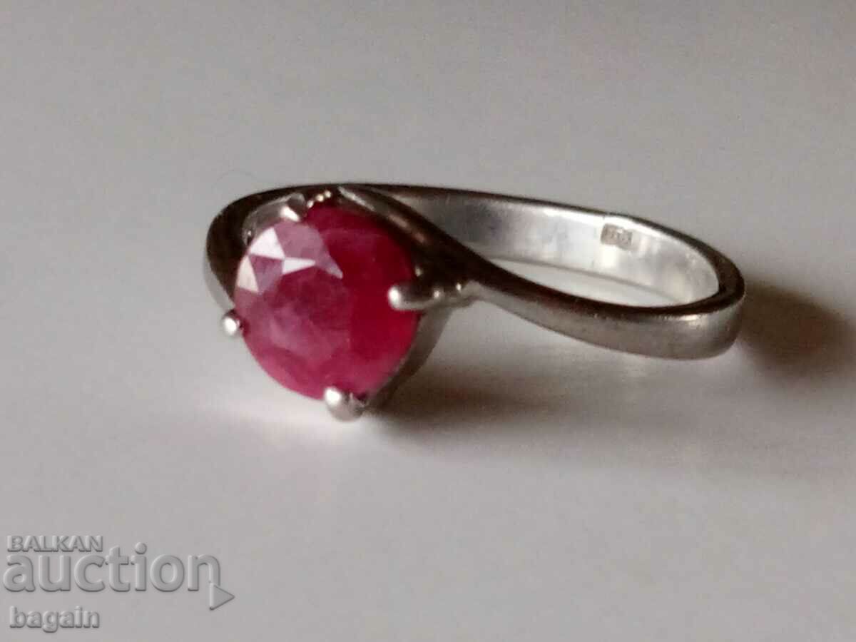 Silver ring with a ruby.