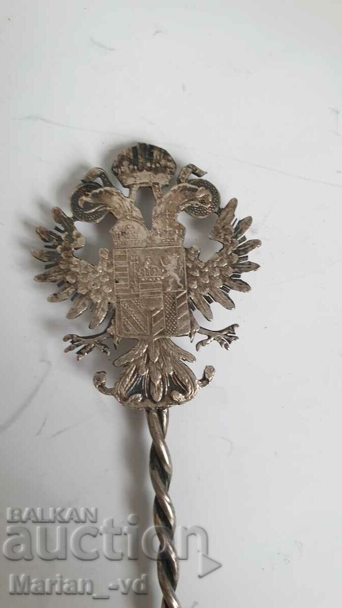 Auction  A silver spoon