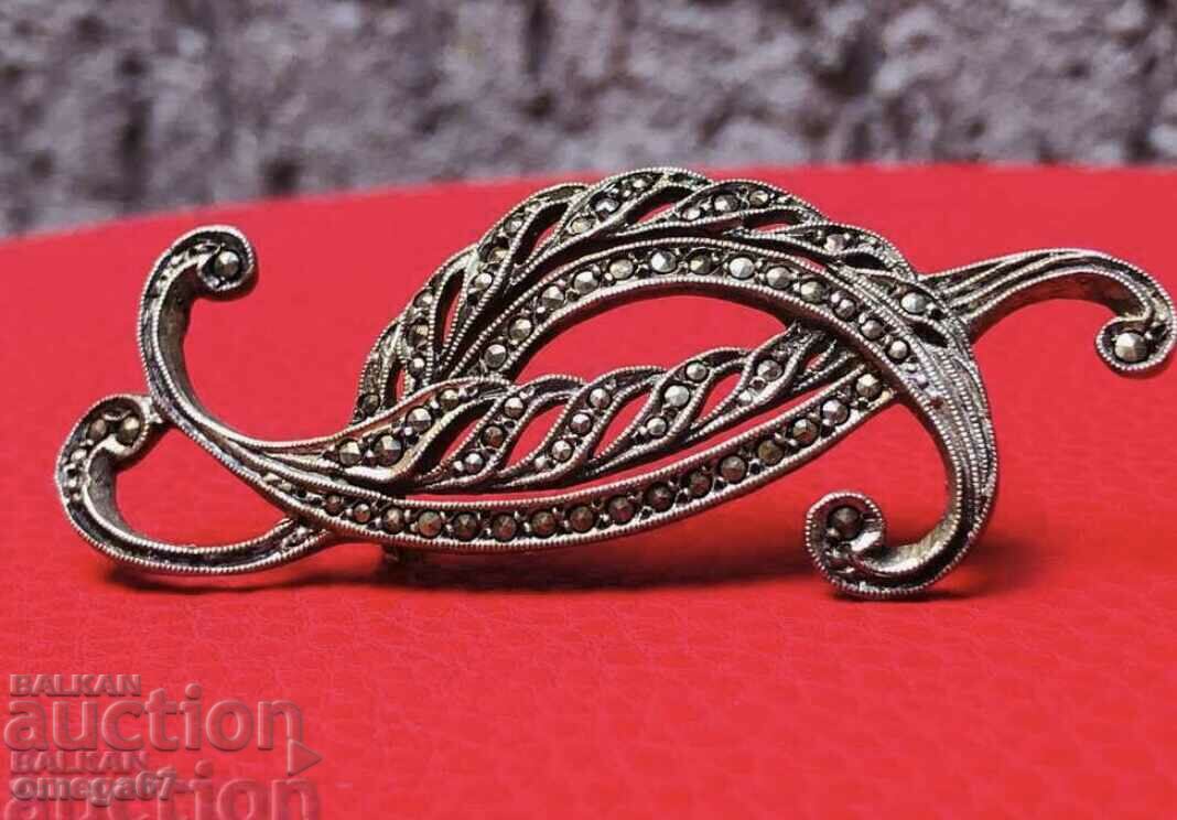 Antique silver marcasite brooch.