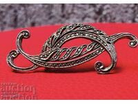 Antique silver marcasite brooch.