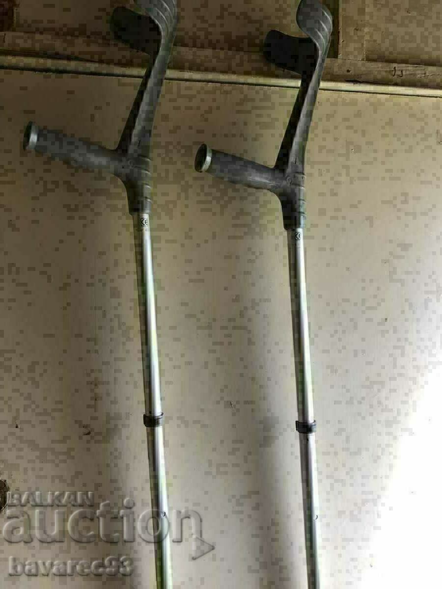 Two crutches / Canadian / for adults.