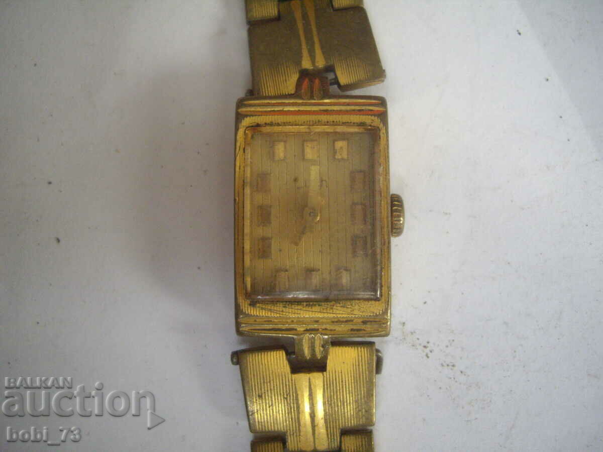 Gold-plated women's wristwatch.