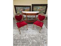 A pair of superb antique metal chairs