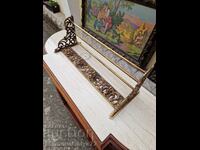 A wonderful antique metal hanger