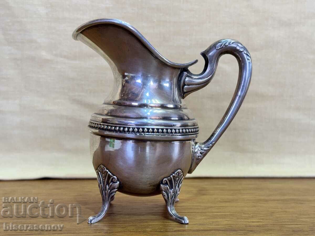 Silver plated jug with markings