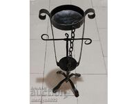 Old wrought iron rotating candle holder, candle, candelabra