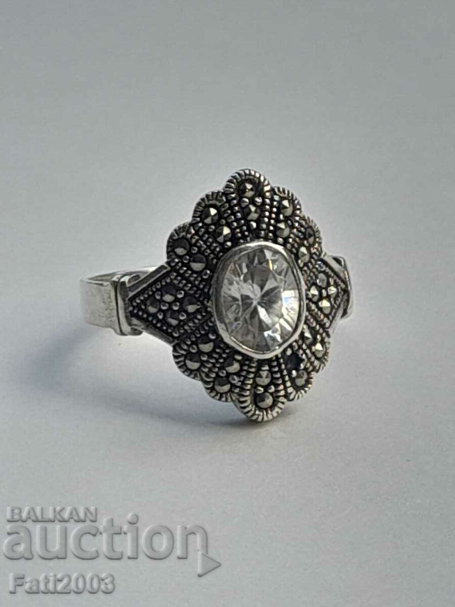 Silver ring with stones