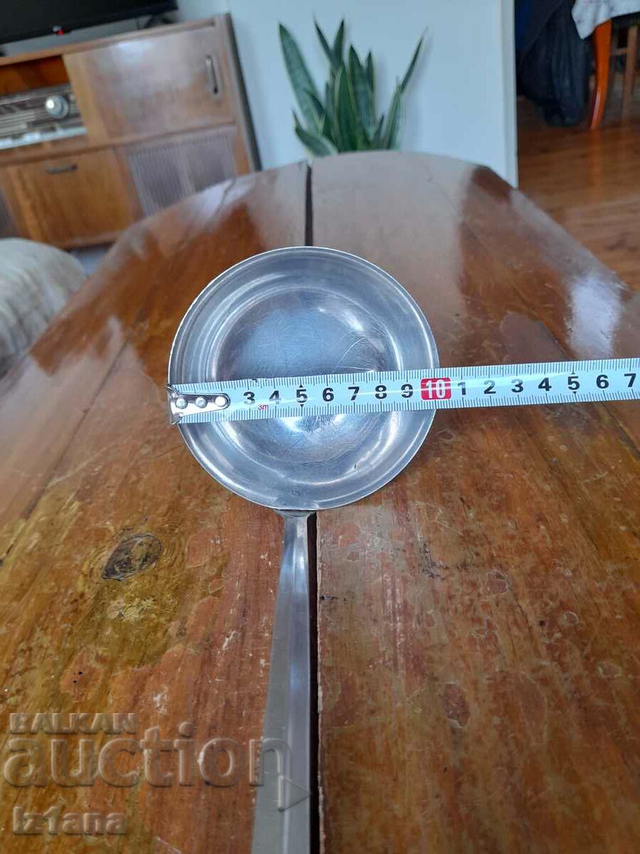 Auction An old ladle Auction An old ladle