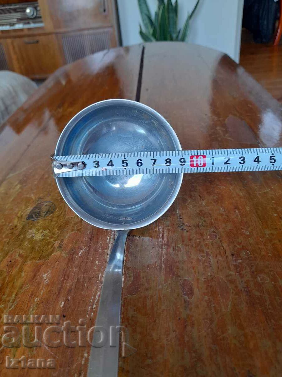 Auction An old ladle Auction An old ladle