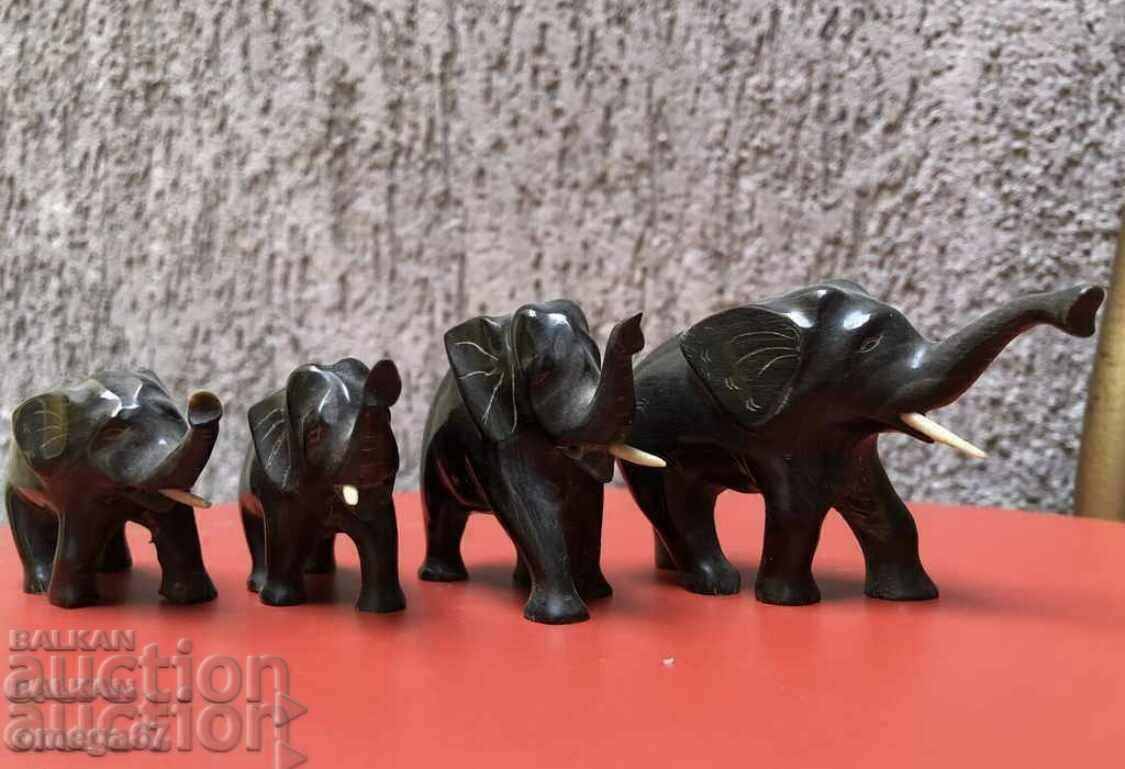 Auction  Set of four baby buffalo horn elephants!