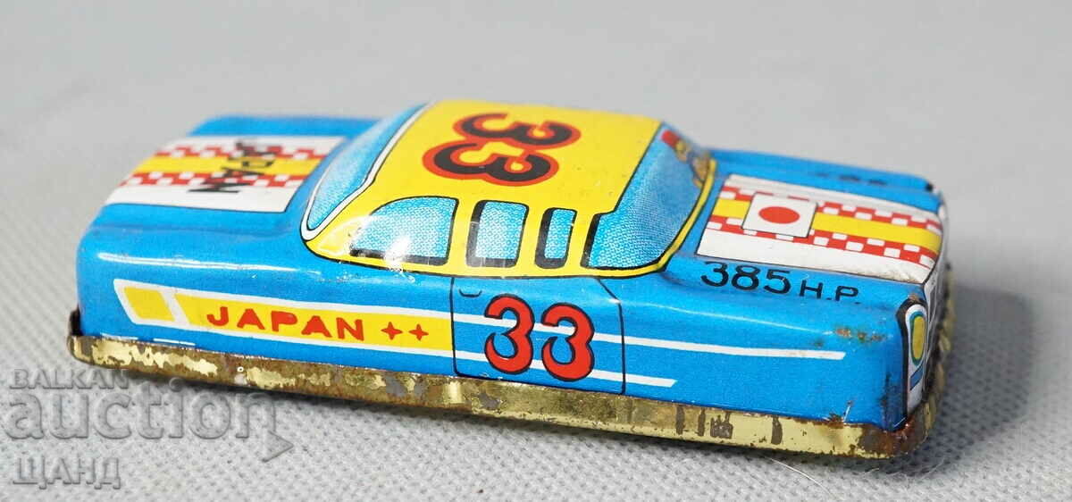 Old Japanese metal sheet metal toy model car