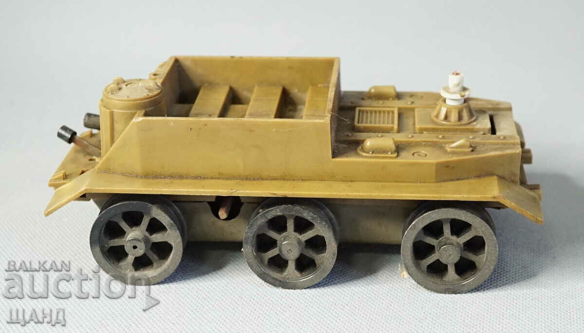 Old plastic mechanical toy tank model