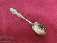 Silver plated spoon with markings