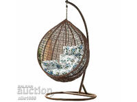 Garden swing made of PVC rattan with metal construction