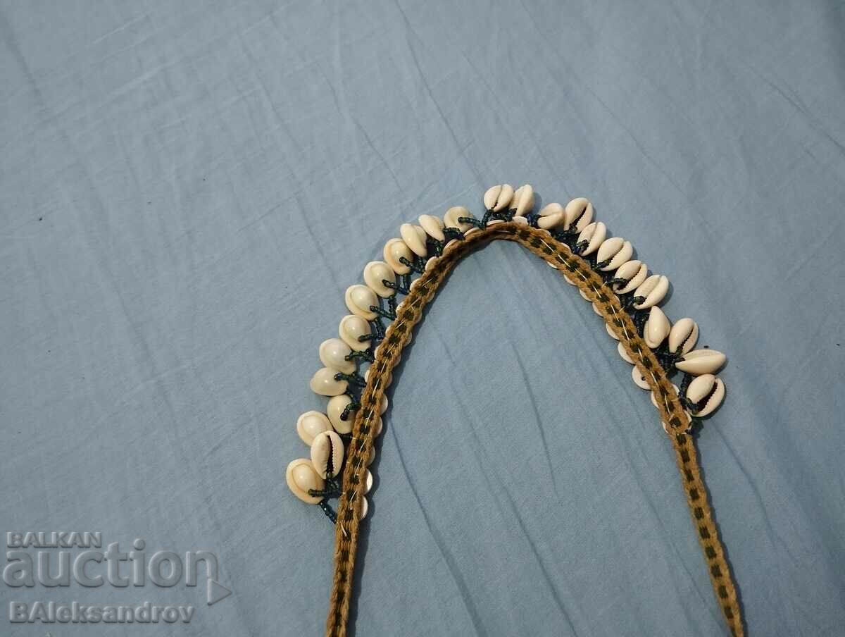Auction An interesting necklace of shells and beads Auction An interesting necklace of shells and beads