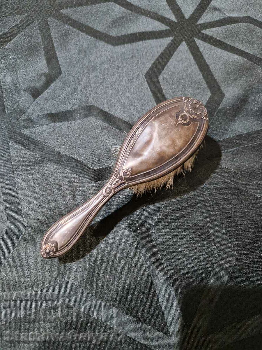 A wonderful antique English silver brush