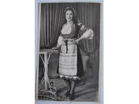 KUSTENDILSKA SAYA SUKMAN WEARING APRON SHIRT WOMAN PHOTO