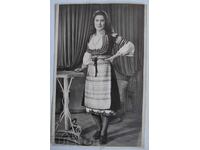 KUSTENDILSKA SAYA SUKMAN WEARING APRON SHIRT WOMAN PHOTO