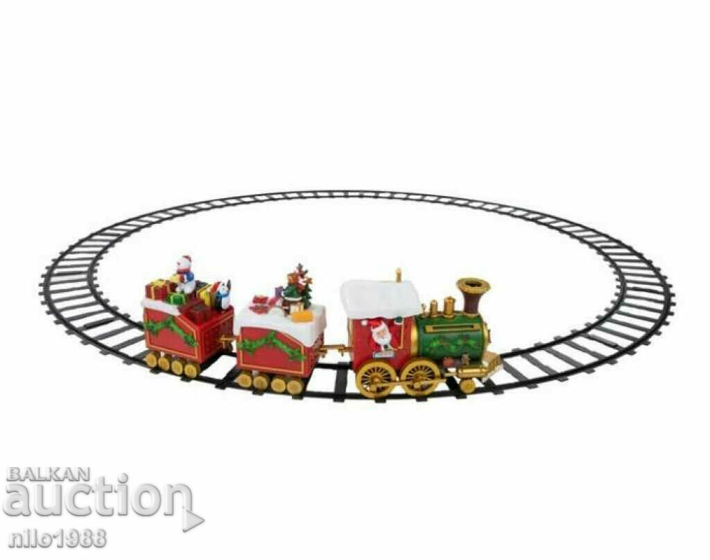 Light-up and musical Christmas train with rails