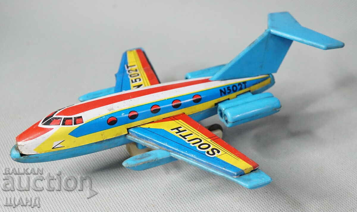 Old metal toy model airplane